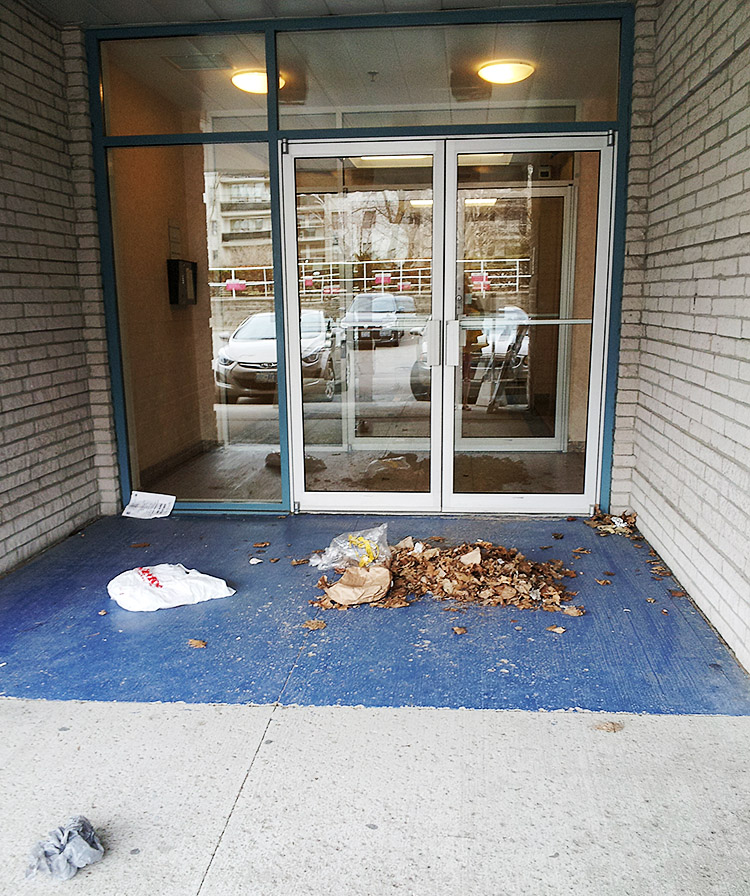 Garbage in front of the main entrance